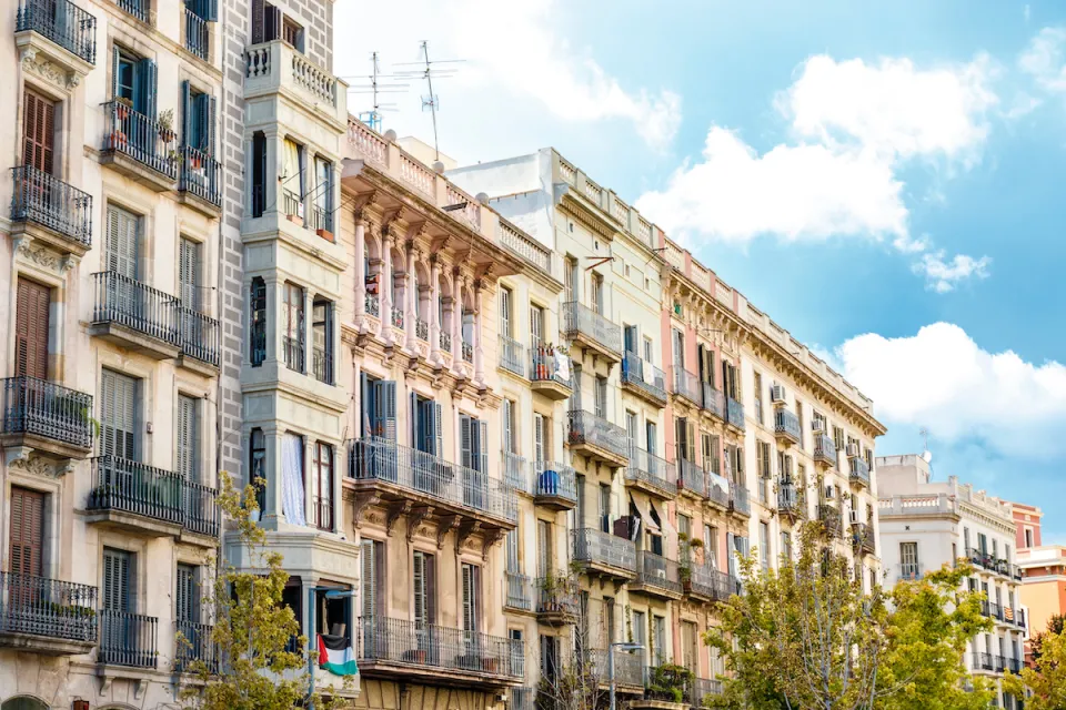 Facades of old apartment buildings in Barcelona, Spain.